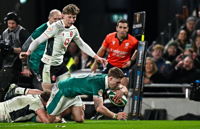 Jack Crowley of Ireland scores his side's second try. Pic: Seb Daly/Sportsfile