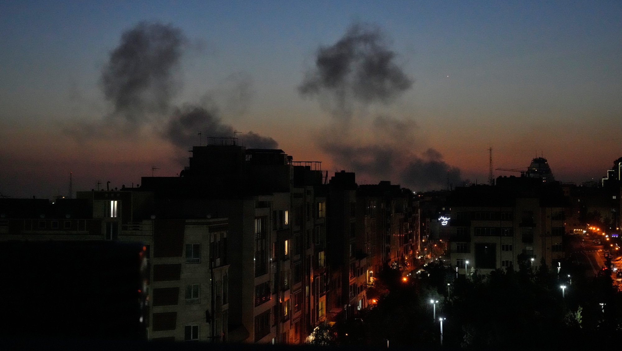 Explosions rock Iran’s capital and more attacks target Israel