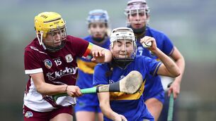 <p>Tipperary’s Caoimhe McCarthy and Galway’s Caoimhe Kelly contest possession at The Ragg. </p>
