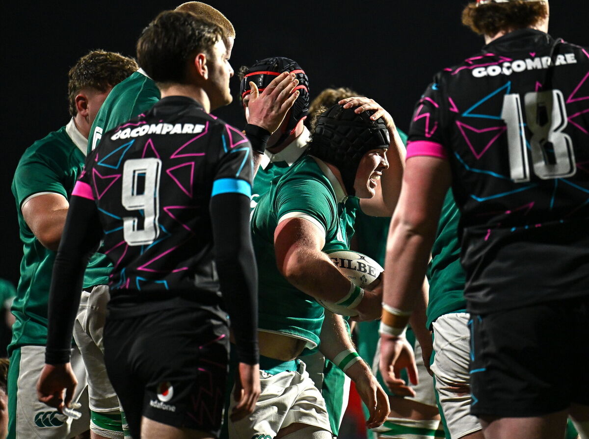 Duinn Maguire of Ireland is congratulated by teammates after scoring his side's seventh try during the U20 Six Nations Rugby Championship match between Ireland and Wales at Virgin Media Park in Cork. Photo by Seb Daly/Sportsfile