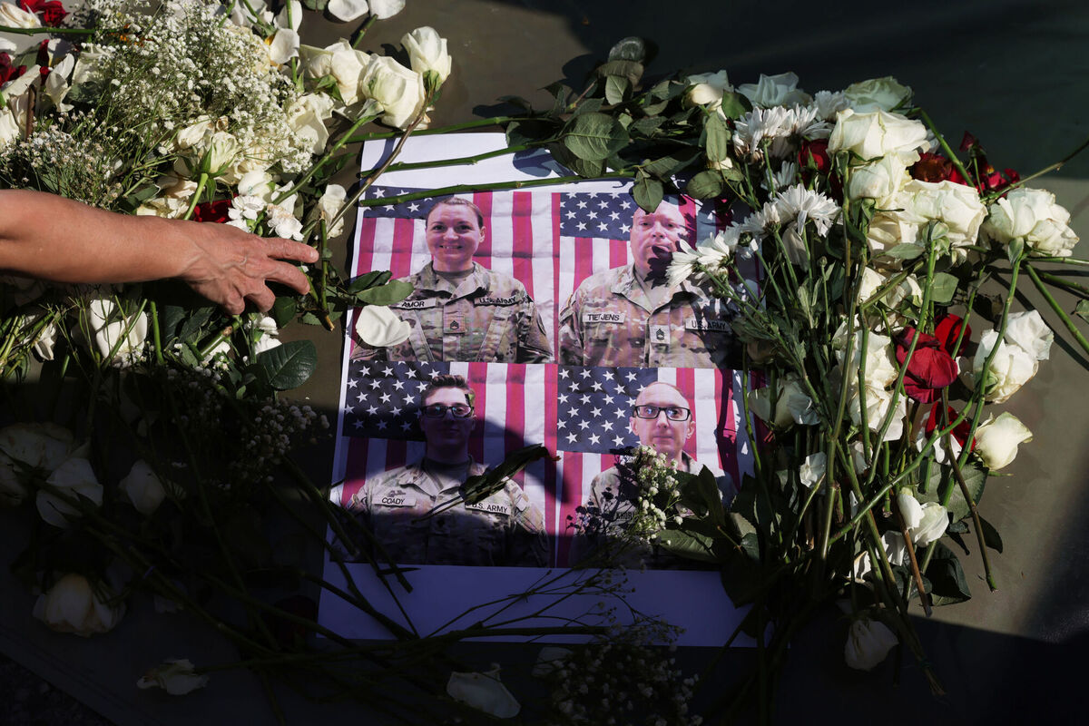 Flowers are seen at a makeshift memorial for US soldiers killed during the Iran war Saturday, March 7, 2026, at a demonstration in Los Angeles. (Picture: AP Photo/Ethan Swope)