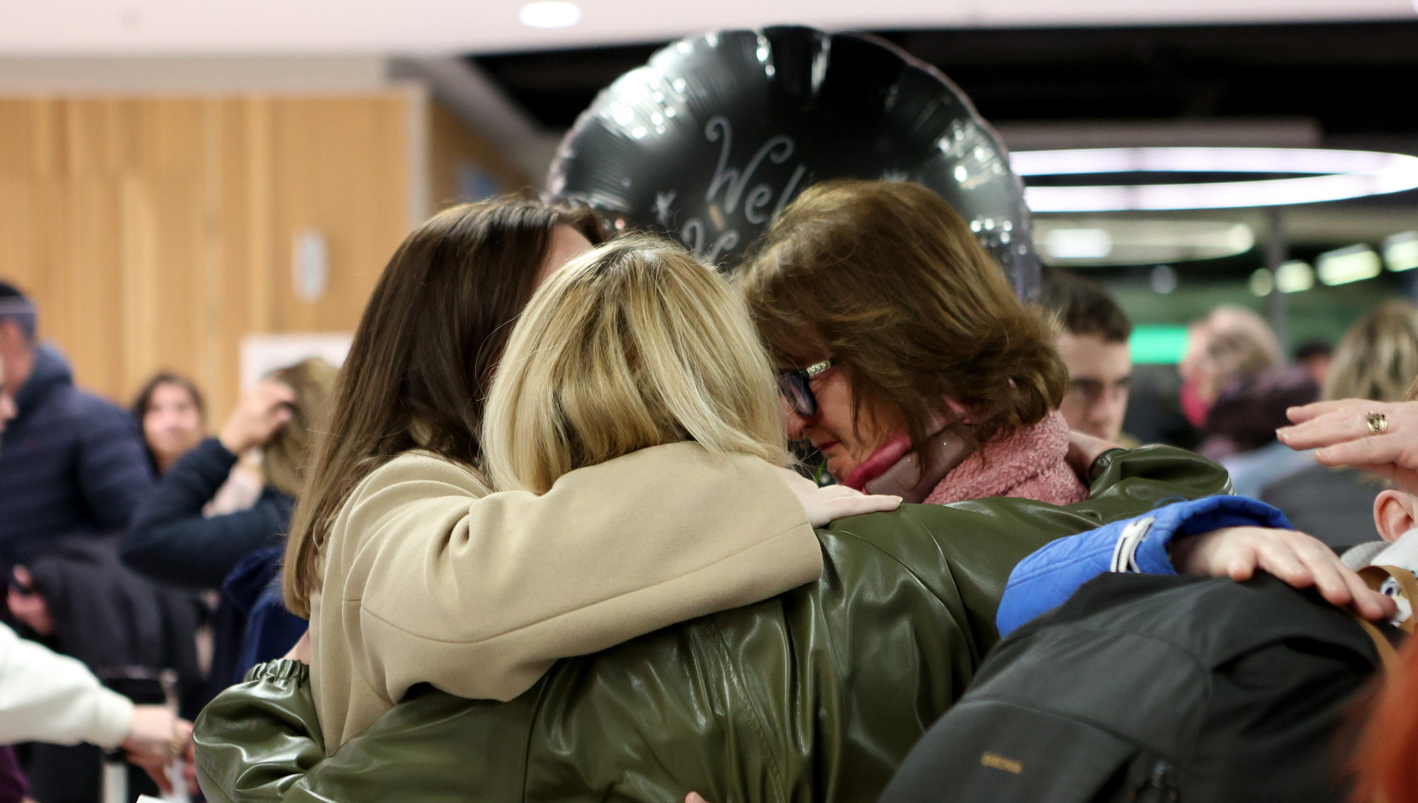 Relieved family reunions at Dublin Airport as chartered flight lands
