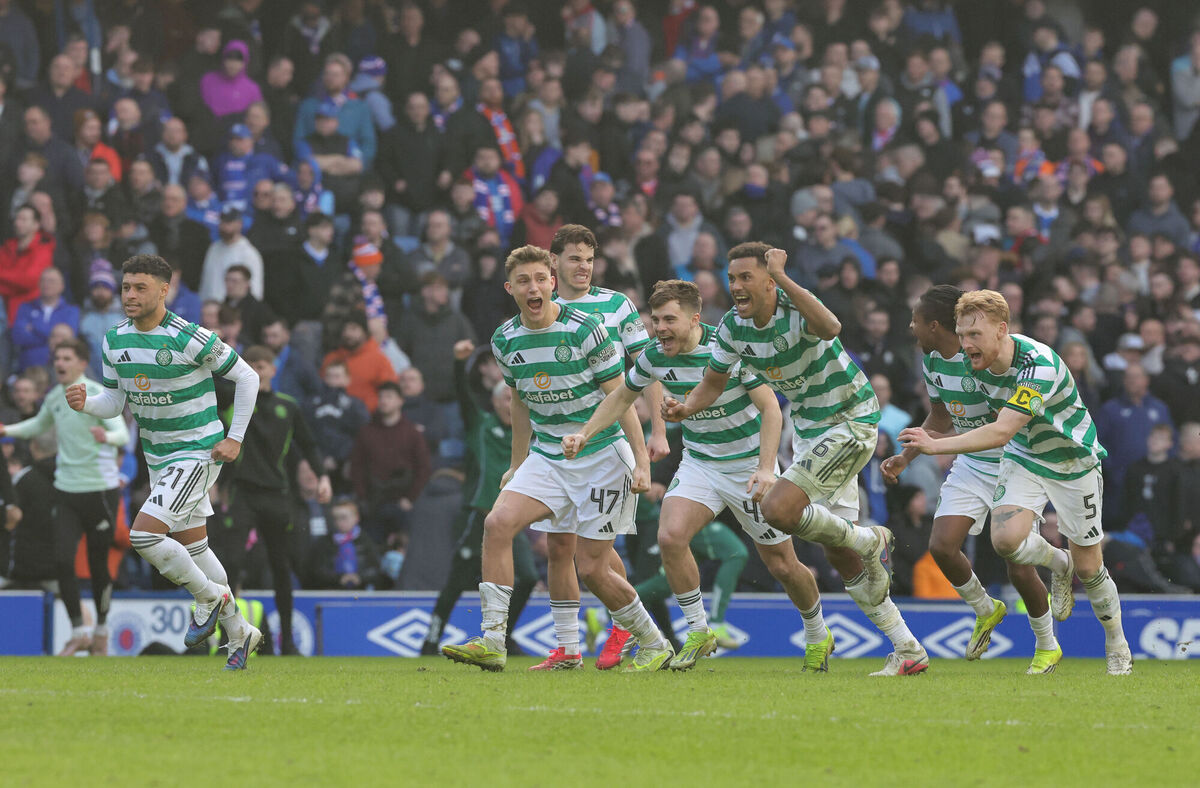 Celtic's players celebrate after their team mate Tomas Cvancara scored the winning penalty. Pic: Steve Welsh/PA Wire.
