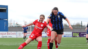 <p>Shelbourne's Maggie Pierce and Hazel Donegan of Athlone Town. Pic: ©INPHO/Bryan Keane</p>