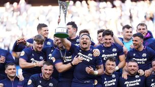 <p>MORE TO COME?: Scotland's Sione Tuipulotu celebrates with The Auld Alliance Trophy and team-mates after the Guinness Men's Six Nations match at Scottish Gas Murrayfield Stadium, Edinburgh. Pic: Jane Barlow/PA Wire</p>