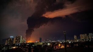 <p>Flames and smoke rise from an oil storage facility struck as attacks hit Tehran on Saturday. Oil prices have surged with no sign of an end ot hostilities in the Middle East. Picture: Alireza Sotakbar/ISNA via AP</p> <p>Flames and smoke rise from an oil storage facility struck as attacks hit Tehran on Saturday. Oil prices have surged with no sign of an end ot hostilities in the Middle East. Picture: Alireza Sotakbar/ISNA via AP</p>