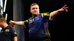 <p>Luke Littler won his second successive UK Open title by again beating James Wade in the Minehead final (David Davies/PA)</p>