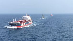 <p>A British navy escort accompanies vessels in the Gulf. Iran's blockade of the Strait of Hormuz s playing havoc with shipping.</p>