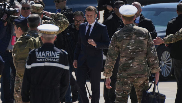French President Emmanuel Macron arrives at Andreas Papandreou Air Base in Paphos, Cyprus (Petros Karadjias/AP)