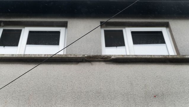<p>Concrete crumbled off this windowsill on a property in Cork City Council's portfolio. Picture: Noel</p>