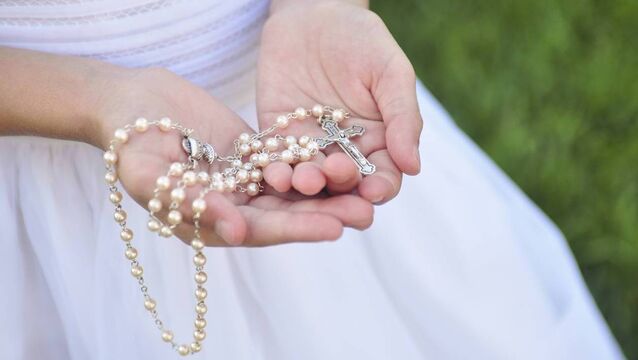 <p>You might say: 'I’m not religious, but we’re doing the Communion for the grandparents and the big day out.' File picture</p>
