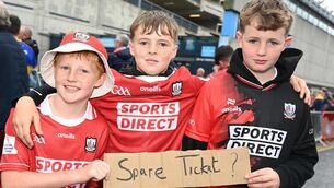 <p>ANY SPARES?: Cork fans Peter, Robert, and Simon Graham from Glanmire on the lookout for tickets. Pic: Eddie O'Hare</p>