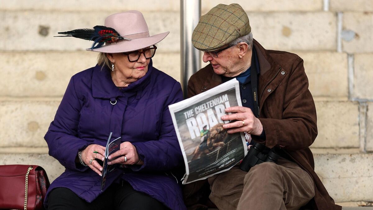 HOW'S THE FORM? Racegoers before day one of the 2026 Cheltenham Racing Festival at Prestbury Park. Pic: Harry Murphy/Sportsfile