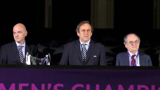 <p>US PAY DAY: Michel Platini and Gianni Infantino, pictured at the 2013 Women’s Champions League final at Stamford Bridge (Nick Potts/PA)</p>