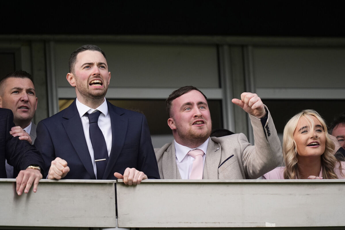 Nathan Aspinall, Luke Humphries and Luke Littler with his partner Faith Millar. Pic: Andrew Matthews/PA Wire.