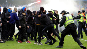 <p>Celtic fans were given the full Broomloan Stand because of Scottish Cup rules, but the police officer in charge of the investigation into Sunday's events has branded that arrangement unsafe. Pic: Steve Welsh/PA Wire.</p>