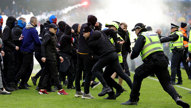 <p>Celtic fans were given the full Broomloan Stand because of Scottish Cup rules, but the police officer in charge of the investigation into Sunday's events has branded that arrangement unsafe. Pic: Steve Welsh/PA Wire.</p>