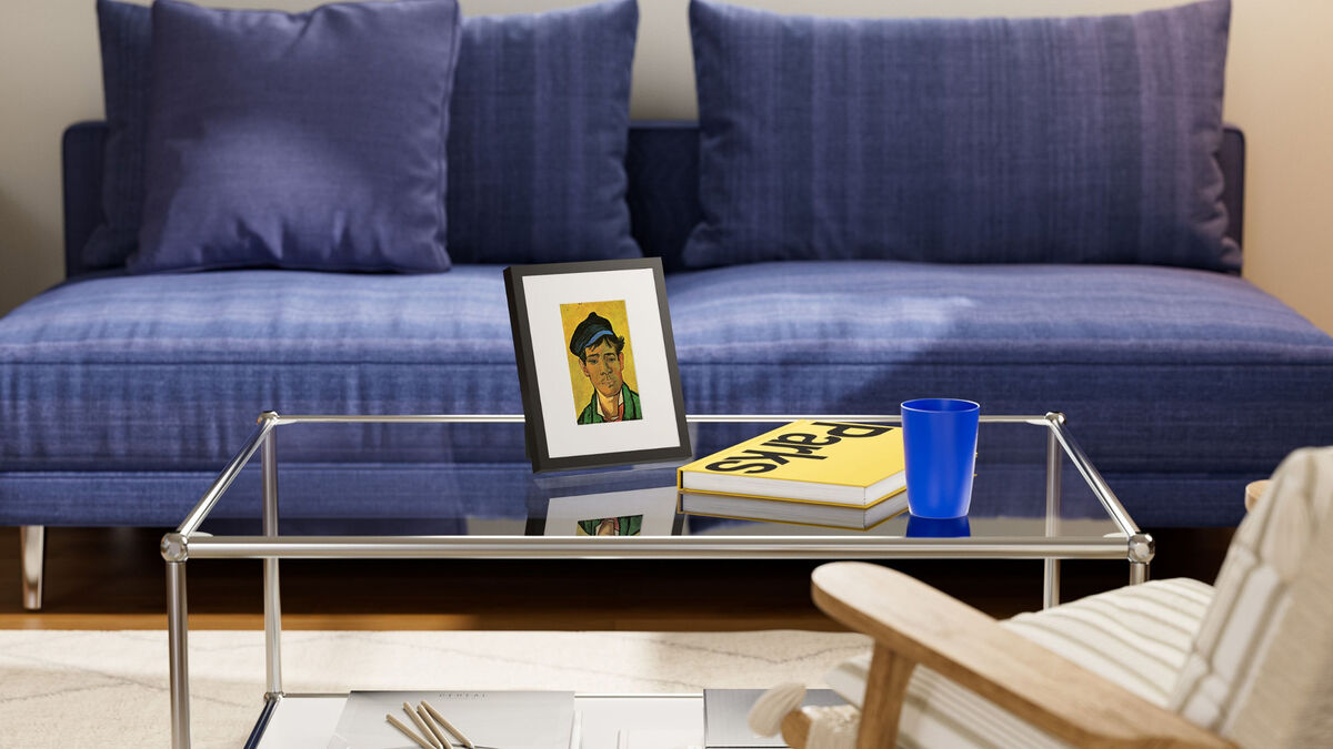 The frame can be hung on a wall or placed on a shelf using the built-in stand, making it easy to fit into almost any room. Picture: SwitchBot.