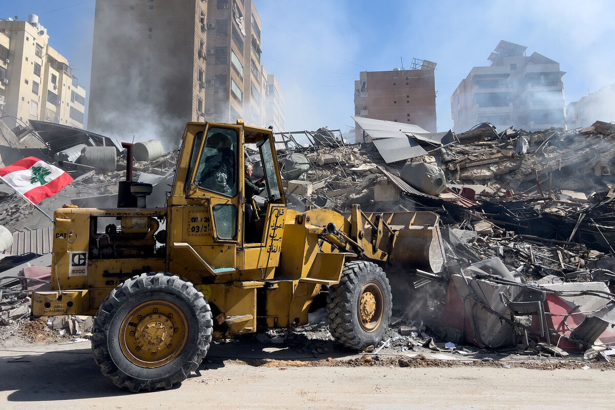 A bulldozer removes the wreckage of a destroyed building that was hit by an Israeli airstrike in Dahiyeh, Beirut's southern suburbs, Lebanon, on  Tuesday. Picture: Hussein Malla/AP