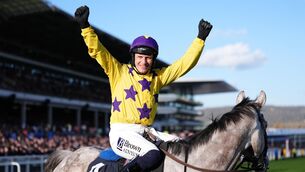 <p>FINALLY: Jockey Paul Townend celebrates on Il Etait Temps after winning the BetMGM Queen Mother Champion Chase. Pic: Adam Davy/PA Wire.</p>