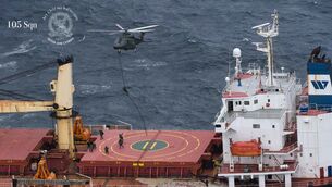 <p>Army Ranger Wing personnel boarding the MV Matthew in July 2025 when they seized 2.2 tonnes of cocaine worth €157m. The new legislation would permit such boardings up to 200 (370km) from the coast. Picture: Irish Air Corps/PA</p>