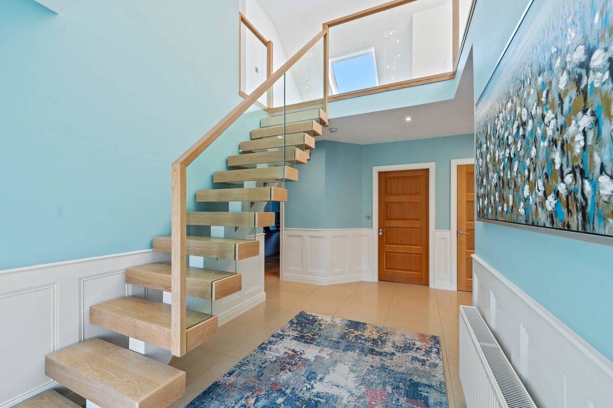 Floating staircase is a striking feature Floating staircase is a striking feature